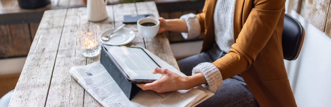 woman scrolling through real source